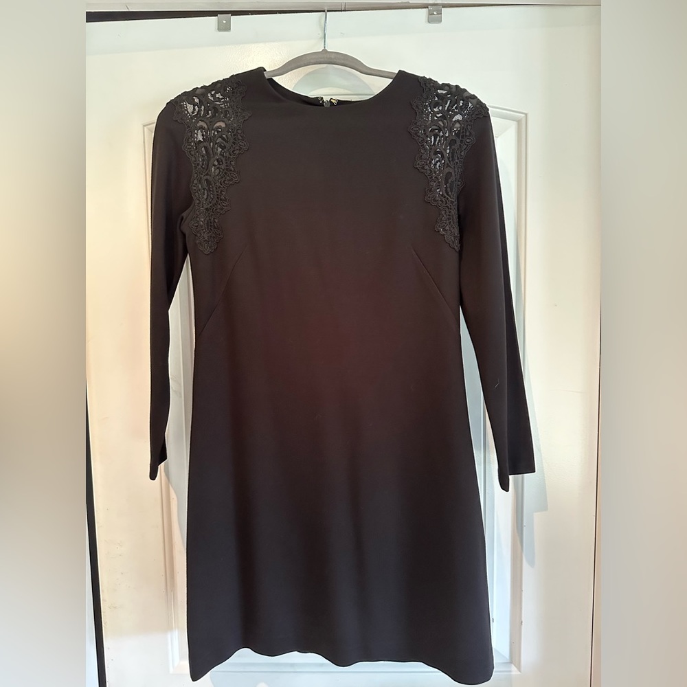 Black 3/4 sleeve mini dress with lace detail at shoulder